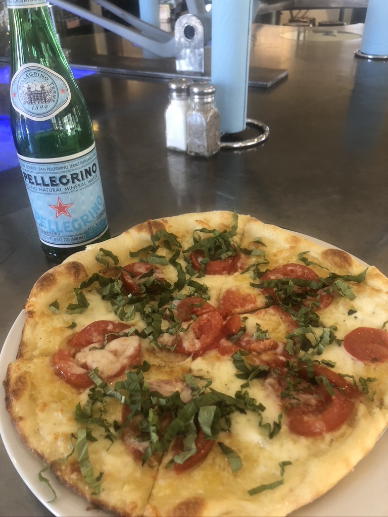 Power House pizza with fresh tomatoes and basil